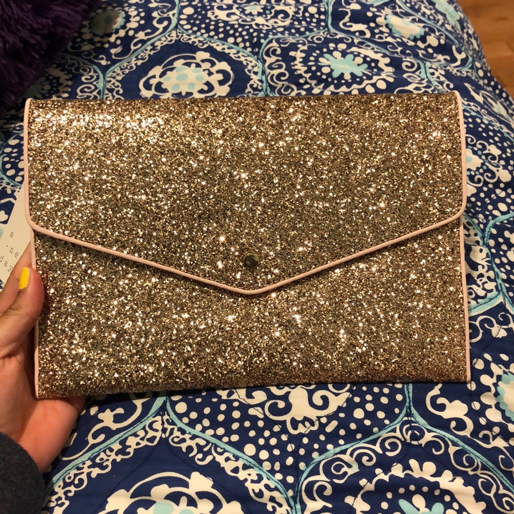 NWT Rose gold handheld clutch